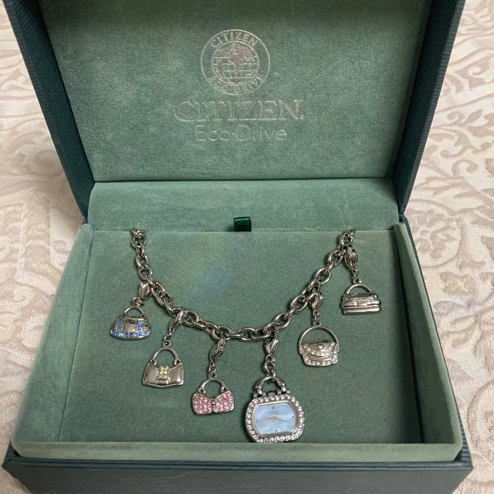 Citizen Ladies Blue Mother Of Pearl Purse Charm Watch Eco-Drive with Swarovski.